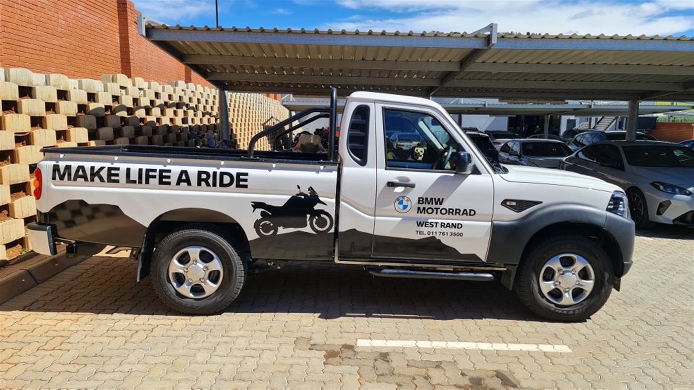 BMW Motorrad West Rand bakkie wrap parked outdoors