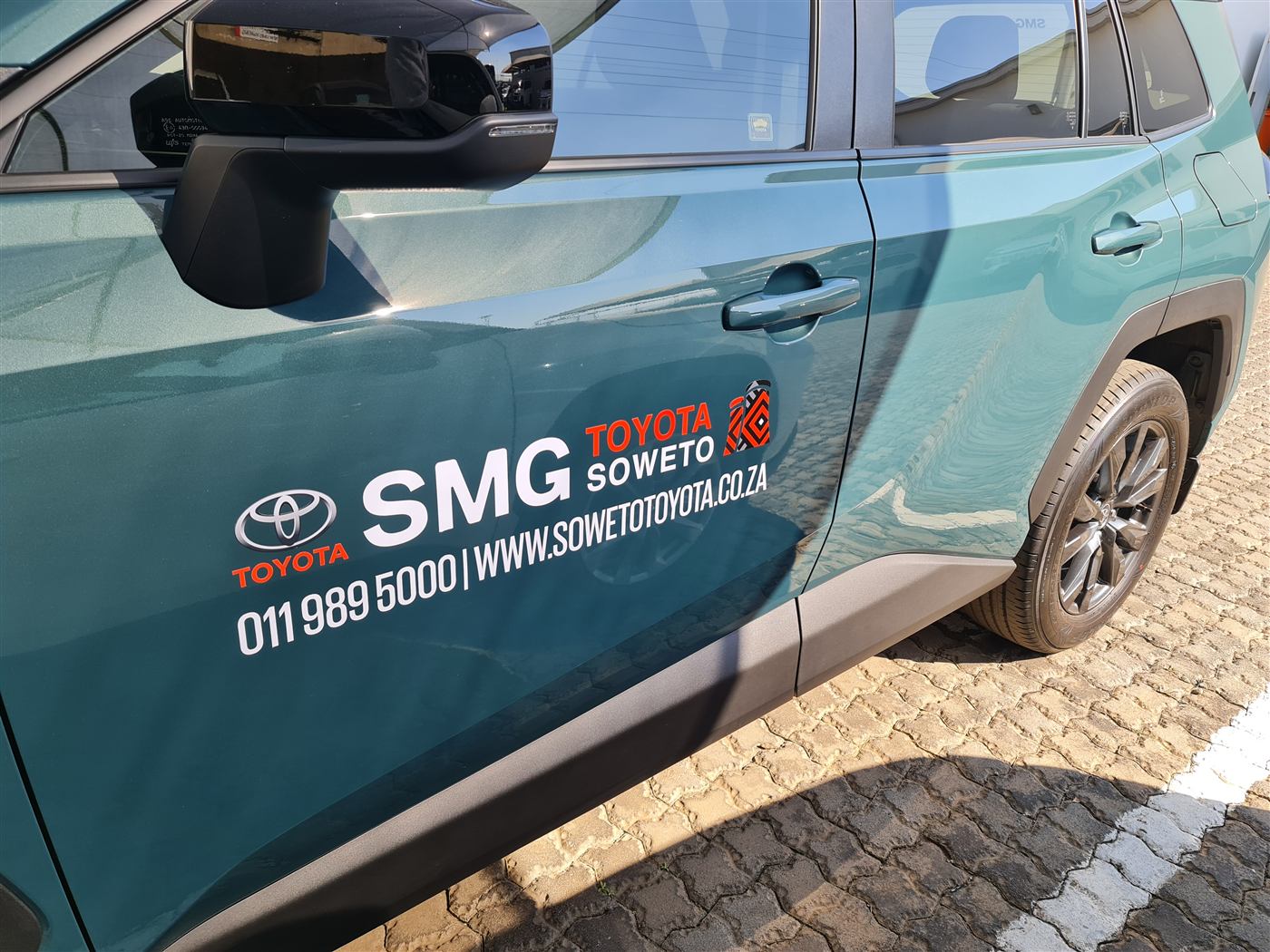 SMG Toyota Soweto decal on a Toyota RAV4 door